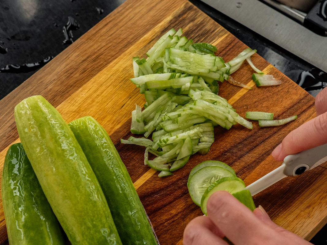 Professional cooking techniques demonstration in modern kitchen